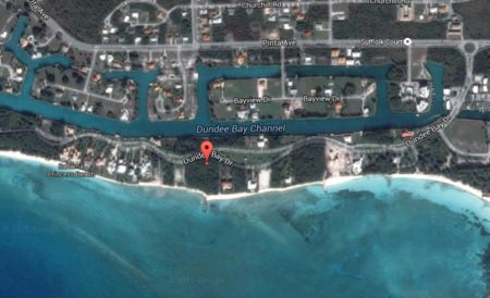 Beachfront Lot with Canal Front Lot in Gated Community